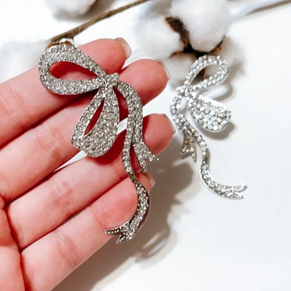 Diamond bow earrings N308